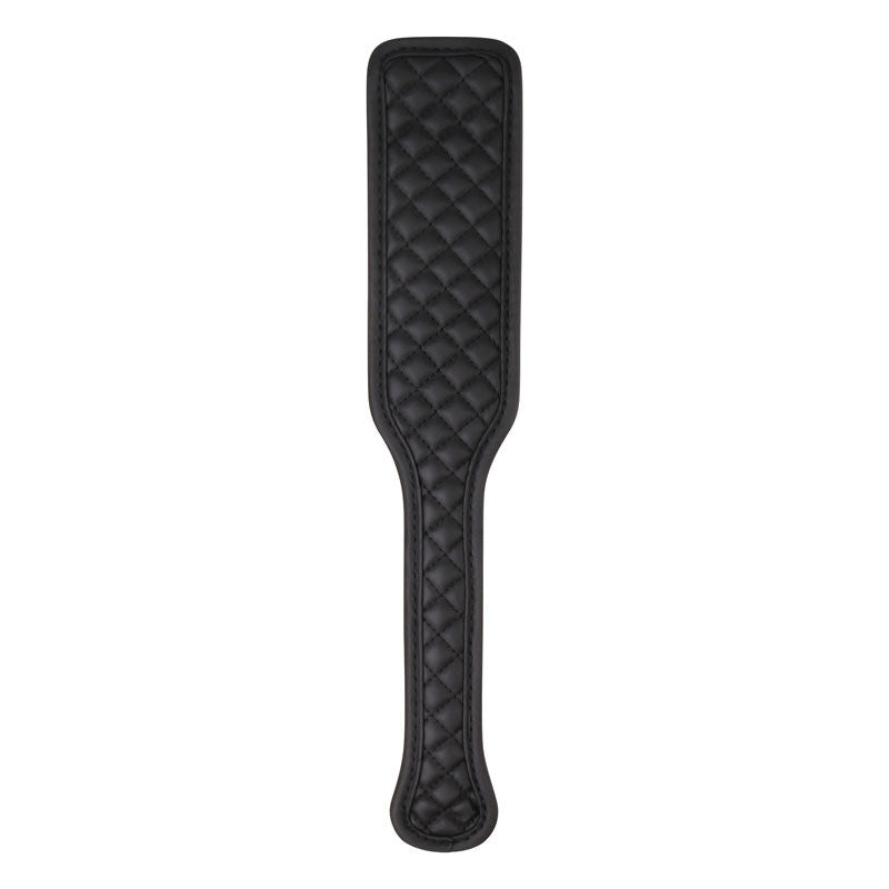 Beginner bondage kit by Adam & Eve with wrist cuffs, ankle cuffs, blindfold, and paddle in padded black vegan leather, focus on paddle | Flirty bay online adult store, adult toys and lingerie